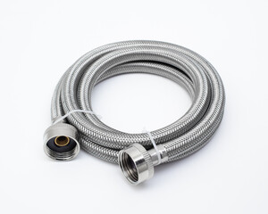 Threaded plumbing hose on white