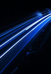 blue car lights at night. long exposure