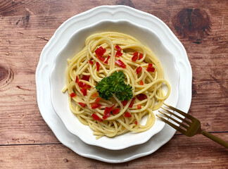 Spaghetti pasta with garlic, olive oil and chili pepper, also known in Italy as spaghetti aglio olio e peperoncino.