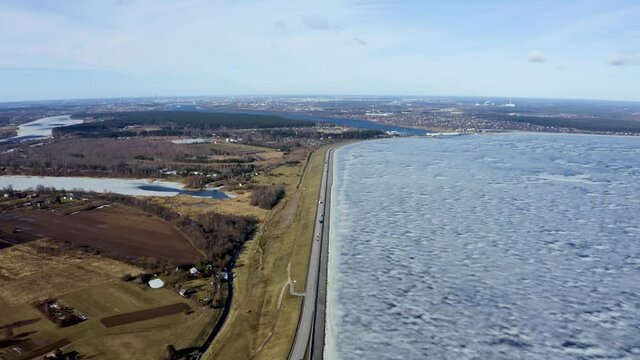 Aerial winter view of the huge dam in Latvia near city of Salaspils and Riga.