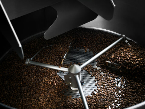 Roasted coffee beans in roaster