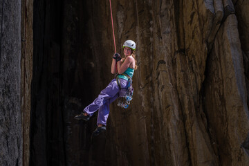 Climber rock climbing, Cookie Cliff, Yosemite National Park, California, United States