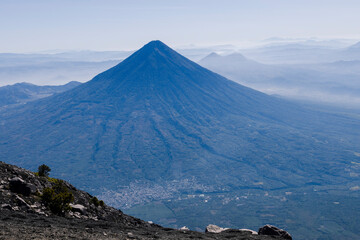 Aerial view of A volcano of water with a clear sky in Guatemala early in the morning seen from the...