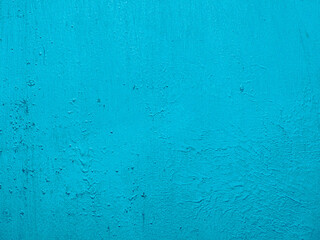 Light blue turquoise textured old wall background. Backdrop