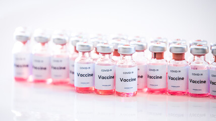 Covid vaccine bottles. Coronavirus medical background