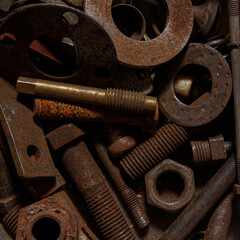 Old rusty bolts, nuts, clamps.