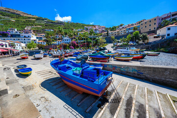 Fototapeta na wymiar Camara de Lobos - beautiful harbor bay and fishing village with beach - Madeira island, Portugal