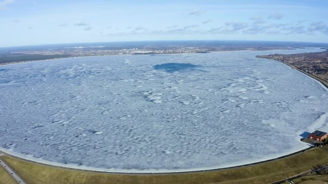 Aerial winter view of the huge dam in Latvia near city of Salaspils and Riga.