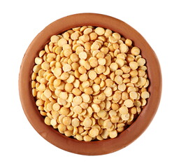 Yellow split peas in clay pot isolated on white background, top view