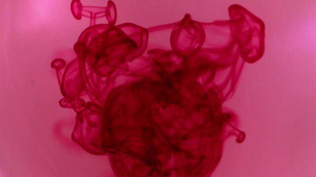 Abstract red texture, Blood in water,  liquid painting, is an amazing organic background for visual effects and motion graphics