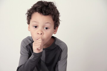 little boy sucking his thumb stock photo