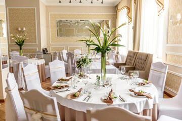 Beautiful decoration of the wedding holiday with flowers and greenery with florist decoration