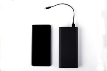 Power bank for charging mobile devices. Smartphone charger.