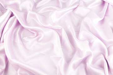 Background and texture; satin fabric with waves.