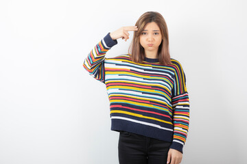 Portrait photo of a young cute woman model standing and posing