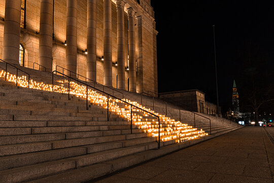 Finland, Helsinki. March 5, 2021. People light candles in front of the parliament building.
Also, candles were lit all over the place in memory of the victim of the brutal murder of a teenager in Kosk