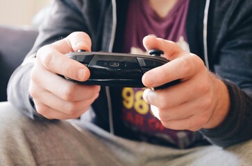 closeup of a man playing computer game