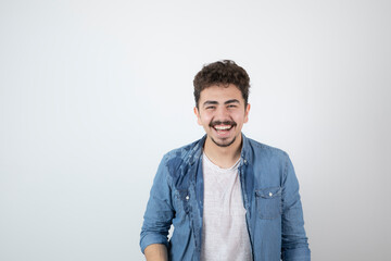 Portrait photo of a young handsome man model with mustache standing