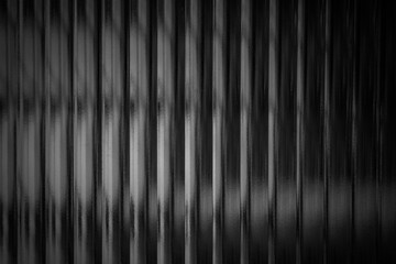 Black background with vertical lines and texture