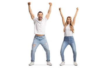 Obraz premium Young man and woman in jeans and white t-shirts gesturing happiness with raised arms