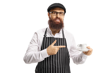Bearded man with an apron holding an espresso coffee and pointing