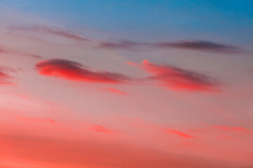 beautiful sky and small clouds at sunrise with  pink and blue colors