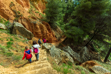 tourists enjoying a mountain excursion in the beautiful village of Anento, considered one of the most beautiful villages in Spain. Anento, Aragon, Spain