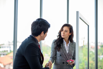Business professionals woman Shake hands  to trade agreement