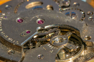 Vintage watch machine macro detail. Close up of old clock.
