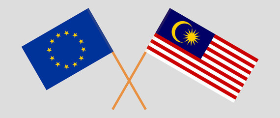 Crossed flags of the European Union and Malaysia. Official colors. Correct proportion