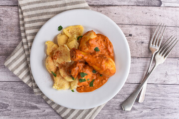 Paprika chicken with dumplings
