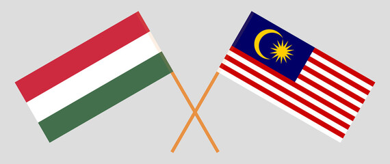 Crossed flags of Hungary and Malaysia. Official colors. Correct proportion