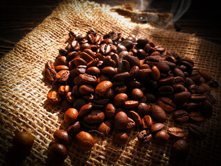 roasted coffee beans on a wooden background