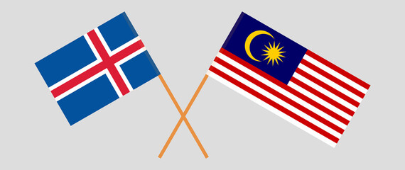 Crossed flags of Iceland and Malaysia. Official colors. Correct proportion