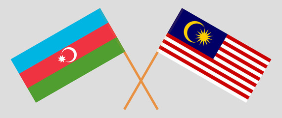 Crossed flags of Azerbaijan and Malaysia. Official colors. Correct proportion