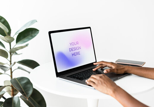 Laptop Screen Mockup on White Table