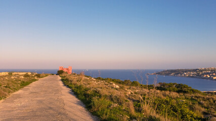 View of the Red Tower above Ghadira bay, Malta