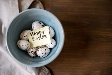 Easter eggs in a bowl with a note.