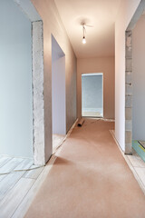 a new apartment repair finishing works in progress, plastering, painting and flooring constraction