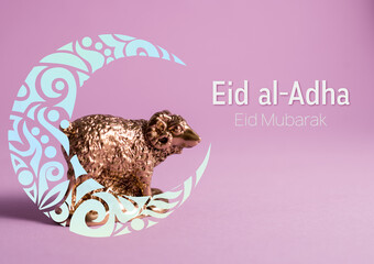 Golden lamb figure decorated with ornamental Crescent Moon on a purple background. Sheep of Eid al-Adha Mubarak or Feast of Sacrifice Kurban Bairam.