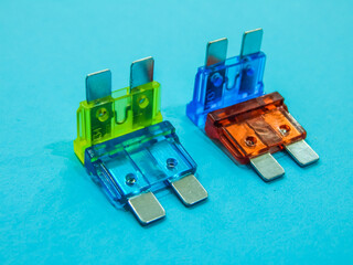 fuses of different colors on a blue background