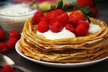 Russian cuisine national dish bliny with fresh berries