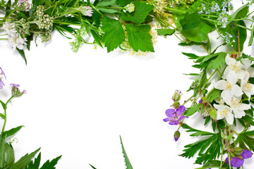 Beautiful flower garland with colorful flowers isolated on a white background. Midsummer celebration concept, summer decoration.