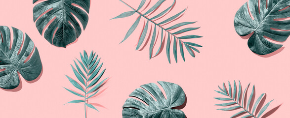 Tropical palm leaves from above - flat lay