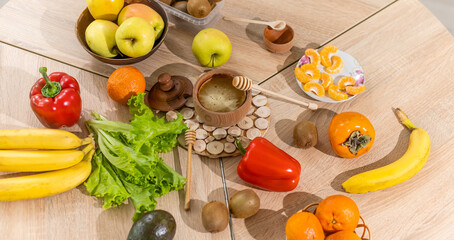 healthy foods are on the table in the kitchen