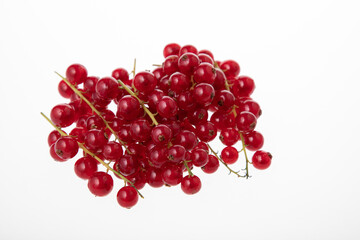 Fresh raw red currant berries isolated on white