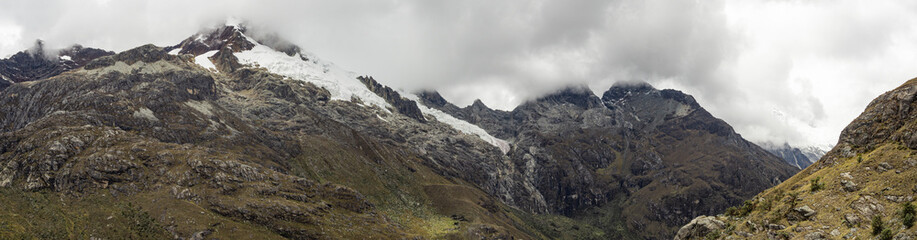 huge beautiful panorama landscape with enormous mountains with ice in huaraz, peru	