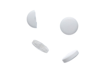 White pills on a white background.
A small round mass of solid medicine.
