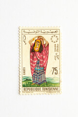 Postage Stamp. A postmark printed in Tunisia, shows Woman of Gabes, circa 1967