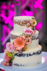 Beautiful wedding cake decorated with flowers